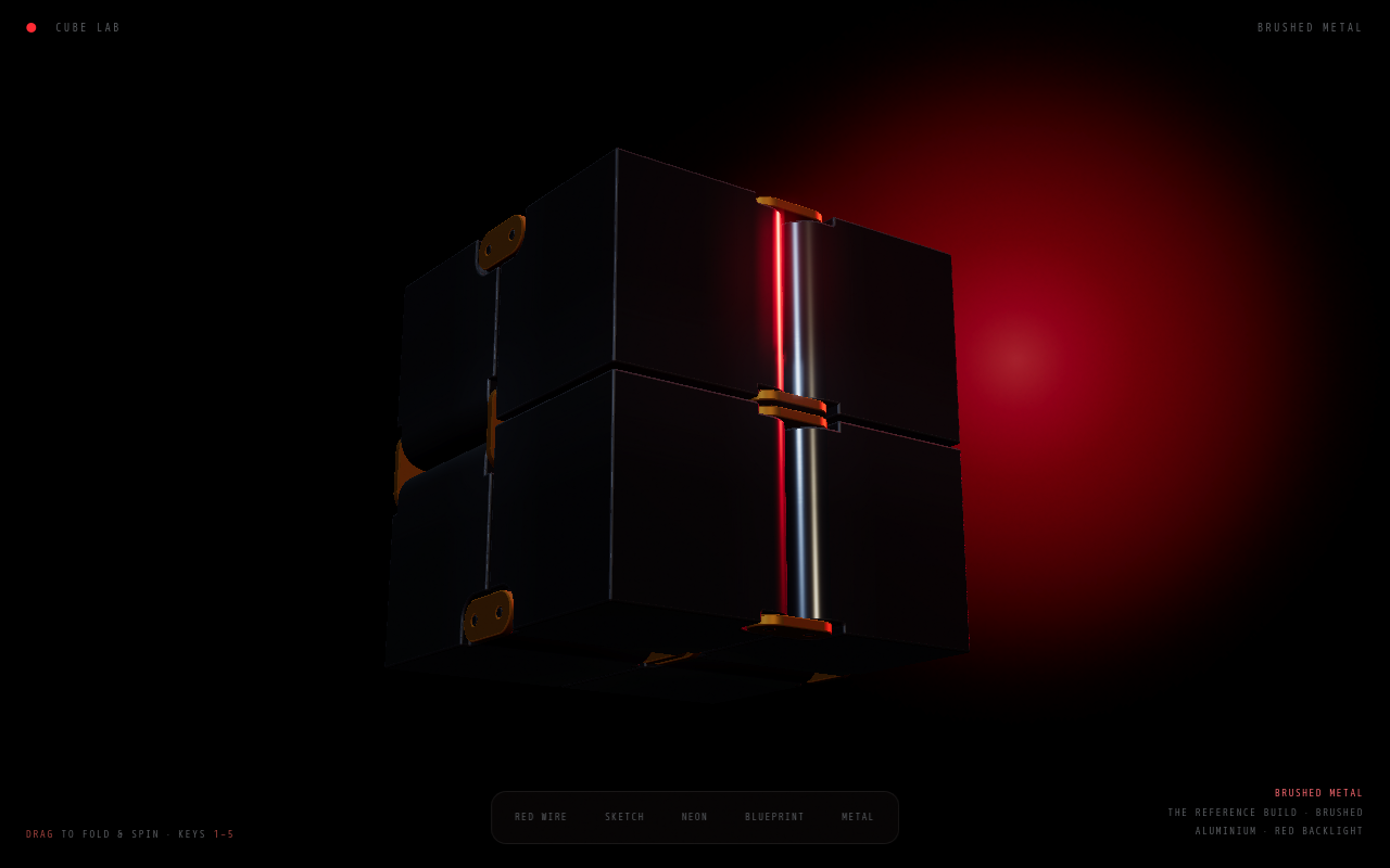 The infinity cube: eight machined black cubes joined by brass hinge plates, modelled and rendered by Ron Abbate.